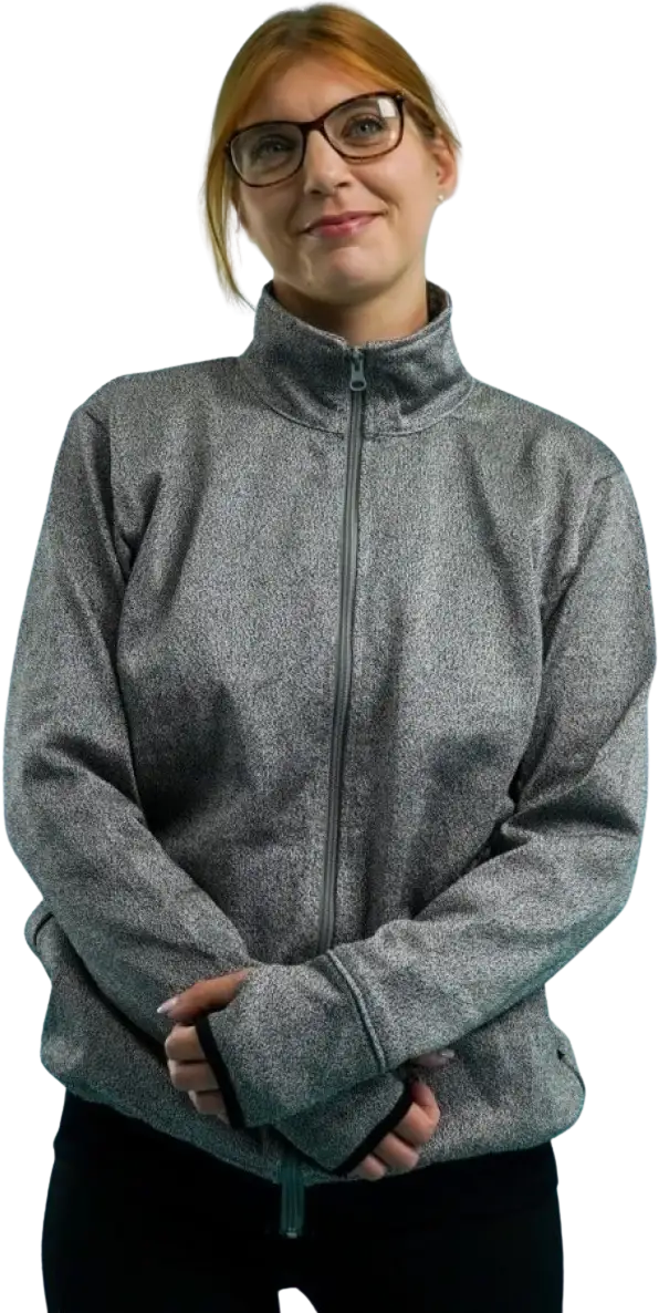 Woman confidently wearing a BitePRO jacket with comprehensive upper body protection, including a high neck and extended sleeves covering the back of the hands