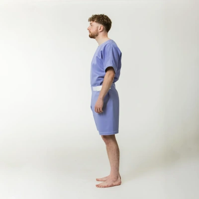 Side on shot of male wearing STRONGTEX anti-ligature shorts